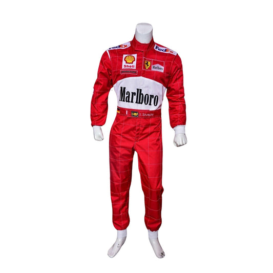 Front view of Michael Schumacher’s 2000 F1 race suit, featuring Ferrari red with white accents and sponsor logos that define his first world championship with the team.