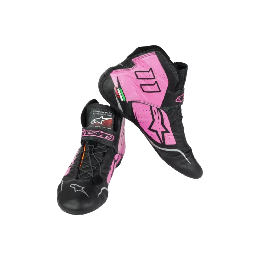 Black and pink Sergio Perez 2017 F1 Racing boots with visible branding on a white background