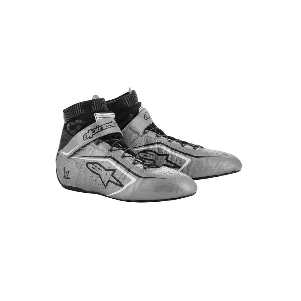 Pair of gray Alpinestars Tech1-Zv2 racing shoes with black accents on a white background