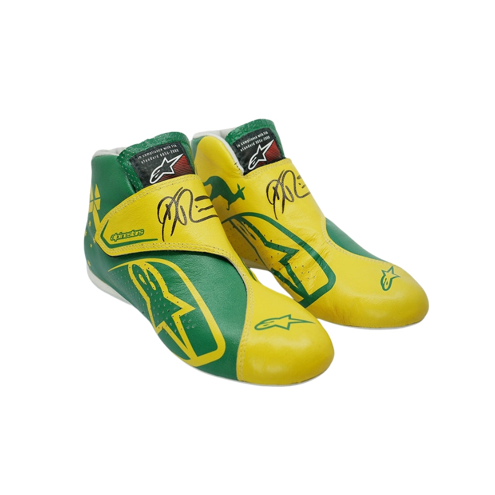 Yellow and green Daniel Ricciardo 2019 Australian Grand Prix F1 racing shoes with branding on a white background