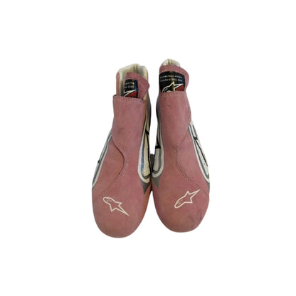 Pair of red Esteban Ocon 2018 F1 Racing shoes with a logo on a white background