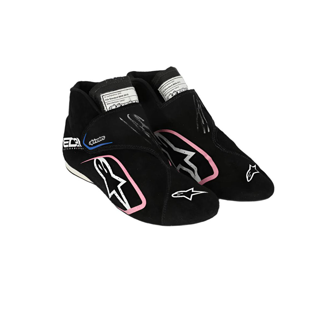 Black  Esteban Ocon 2023 Miami GP F1 racing shoes with pink accents on a white background