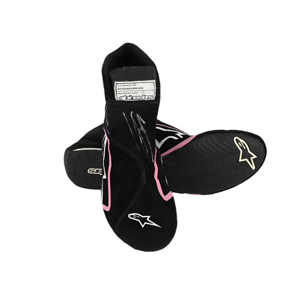 Black Esteban Ocon 2023 Miami GP F1 racing boots with pink accents on a white background