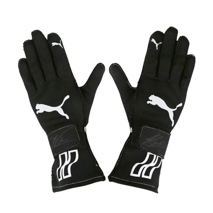 Pair of black Helio Castroneves 2017/18 IndyCar IMSA racing gloves with Puma logo on a white background