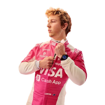 Liam Lawson wearing a pink Miami GP RB 2025 F1 racing suit with various brand logos on a white background