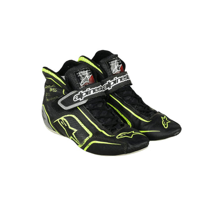 Black and yellow Linus Lunqvist Championship HMD 2022 Indy Lights racing shoes with visible branding on a white background