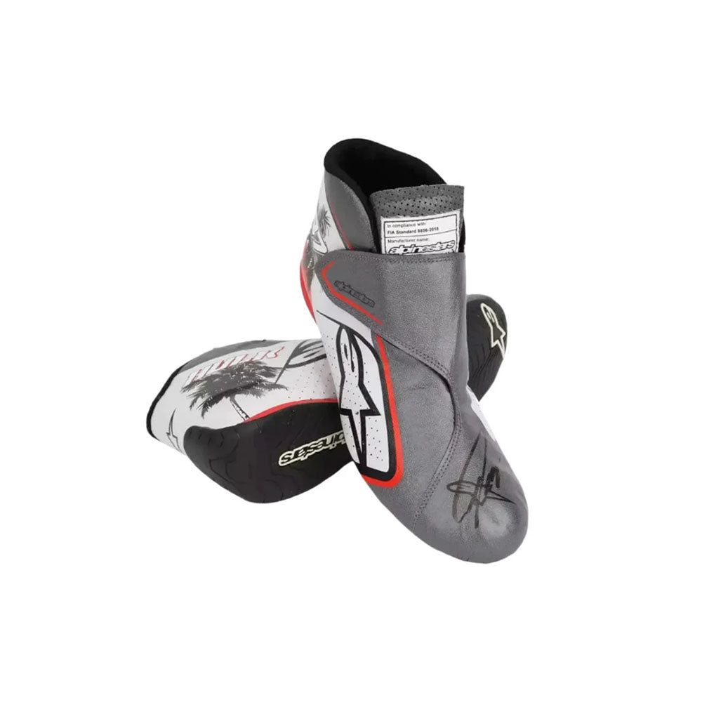 Pair of gray and black protective Nico Hulkenberg 2023 Miami GP Weekend Worn F1 Racing boots on a white background