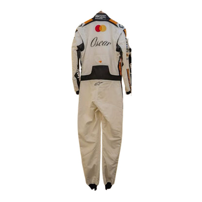 Oscar Piastri wearing a 2025 Monaco GP McLaren F1 White racing suit with black and orange accents on a white background