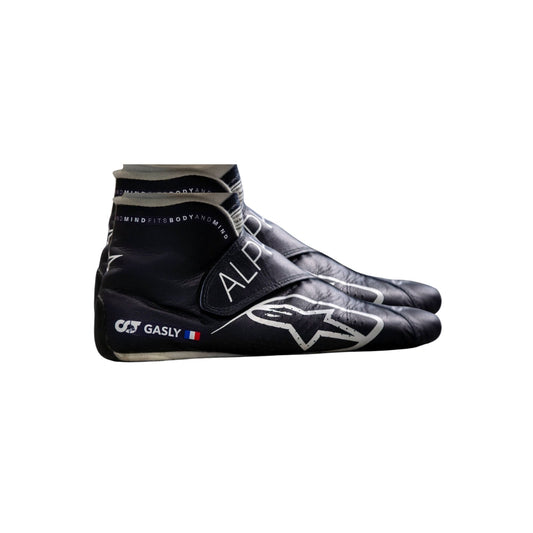 Black high-top Pierre Gasly 2022 F1 Racing shoes with branding on a white background