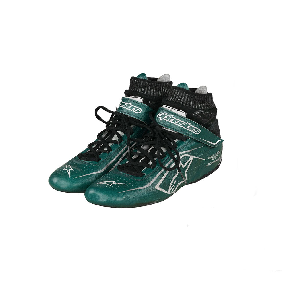 Pair of green Sebastian Vettel 2022 F1 Racing shoes with black accents on a white background
