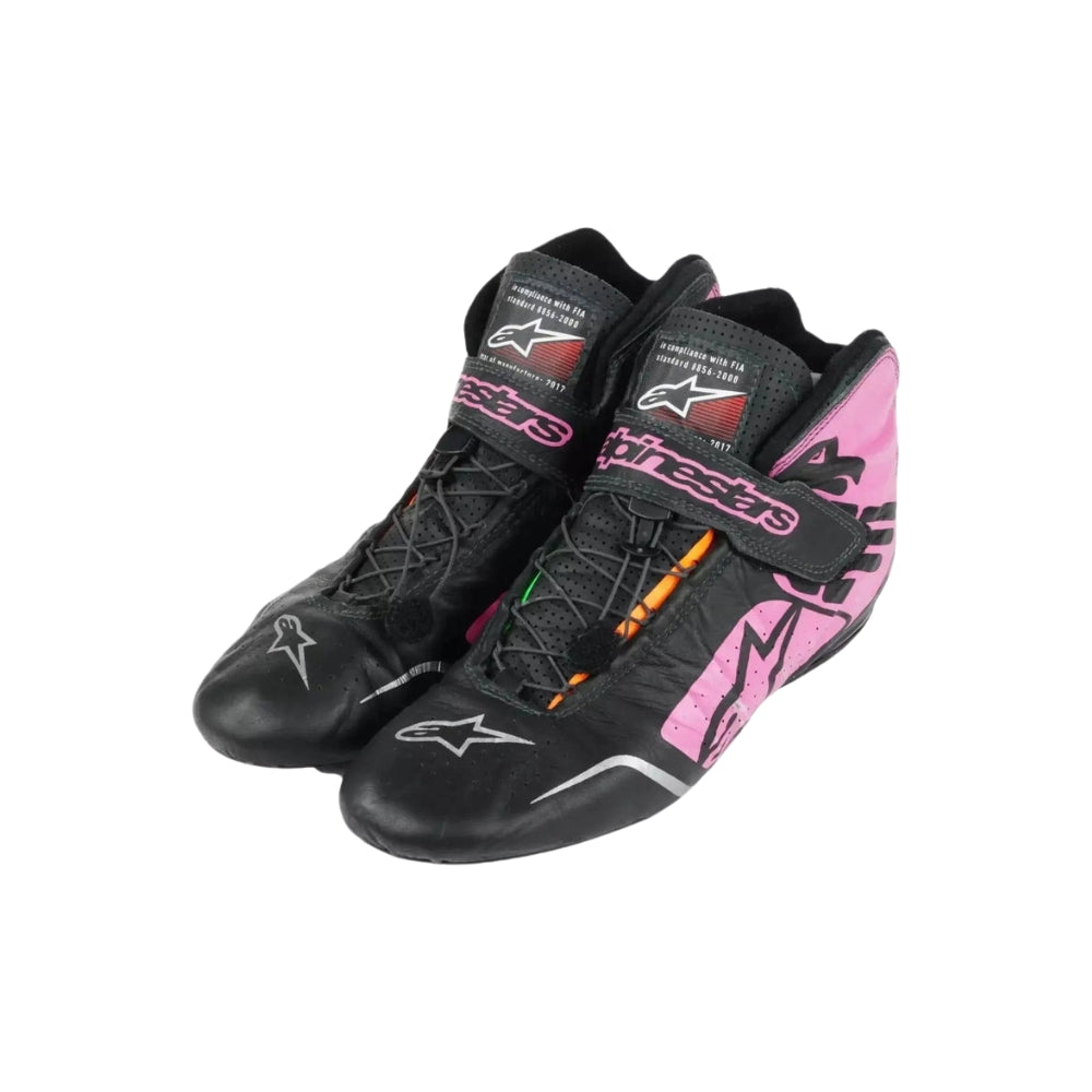 Black and pink Sergio Perez 2017 F1 Racing shoes with brand logo on a white background