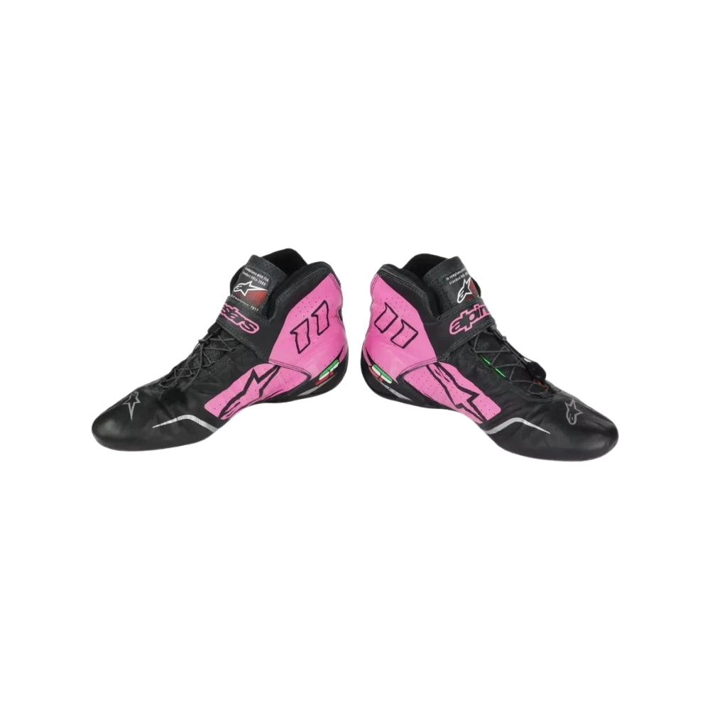 Pair of black and pink high-top Sergio Perez 2017 F1 Racing shoes on a white background