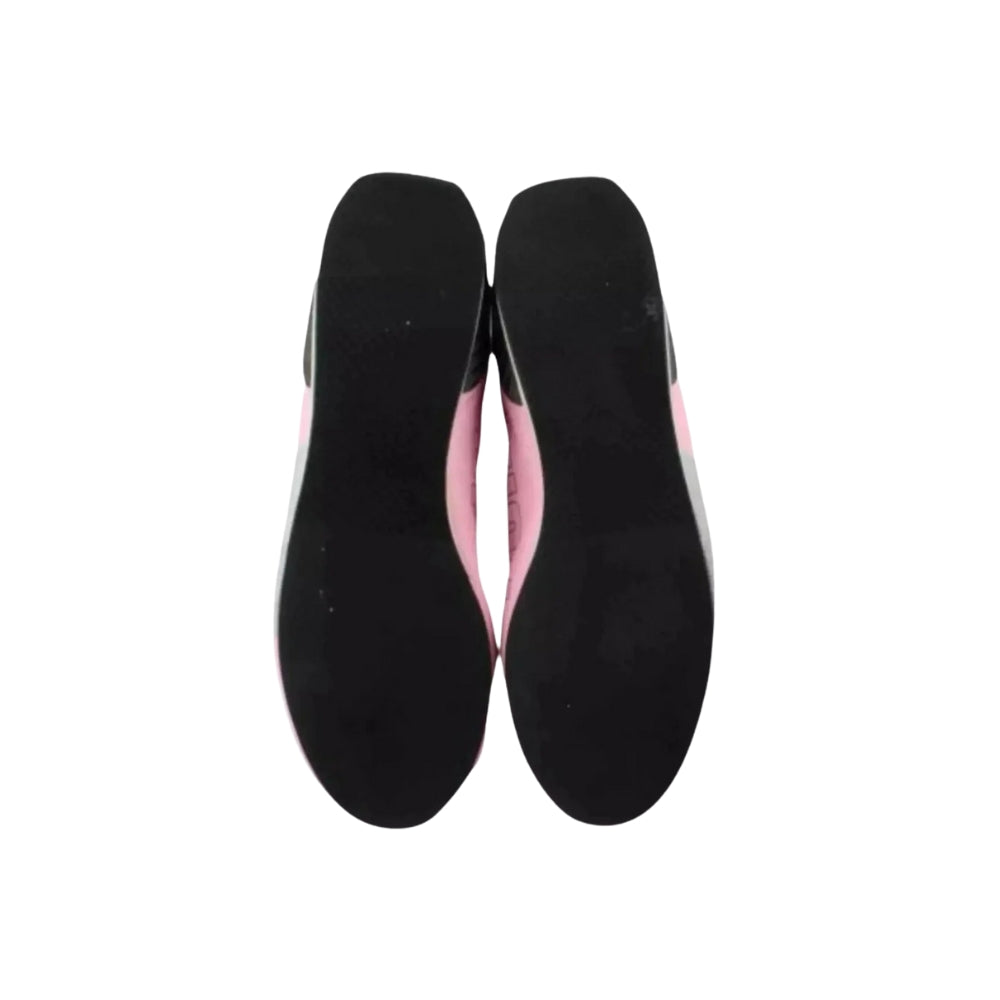 Black Sergio Perez 2019 F1 Racing shoe insoles with pink lining on a white background
