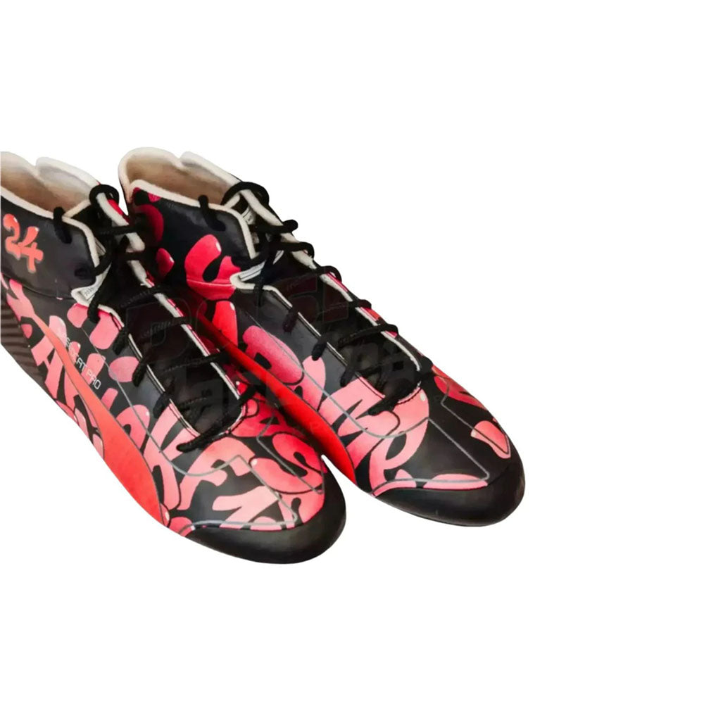 Black and red patterned Zhou Guanyu 2023 Special Edition F1 Racing shoes on a white background